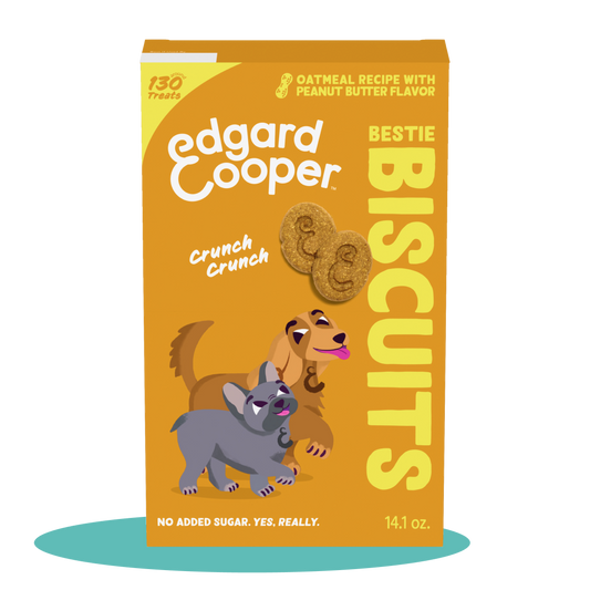 An orange bag of Edgard & Cooper oat and peanut butter dog biscuits