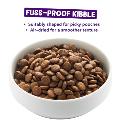 Bowl of fuss-proof kibble with text on a white background