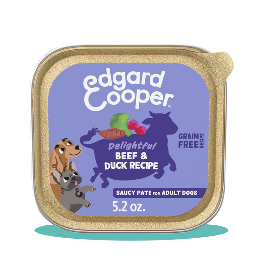 A tin of Edgard & Cooper tinned puppy beef and duck food